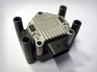 Wasted spark coil pack with built in ignitors